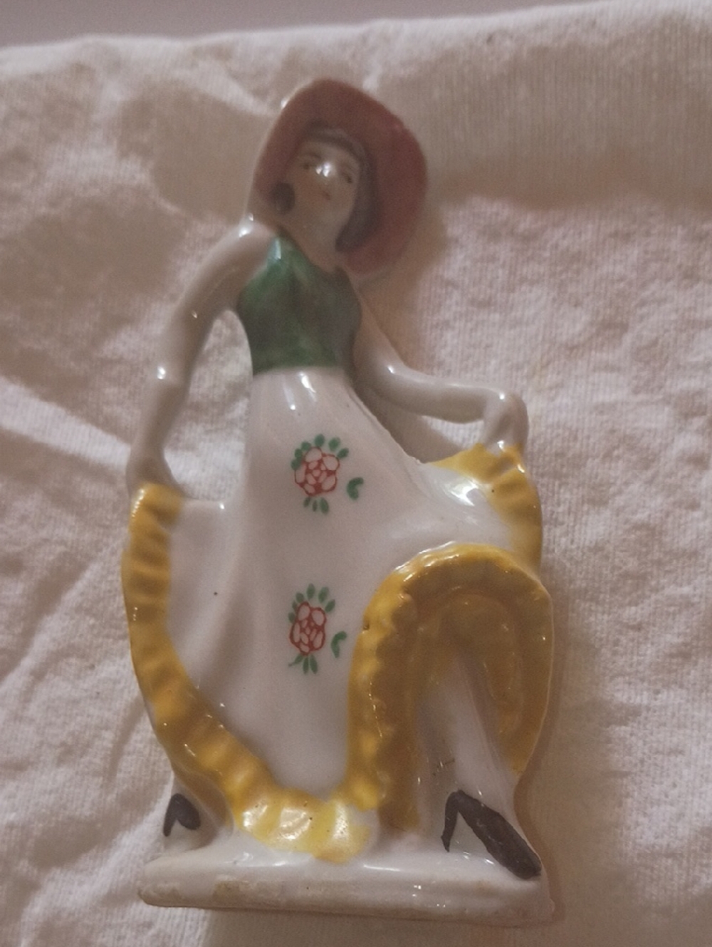 Porcelain Lady Figurine with Yellow Trim and Green Bodice